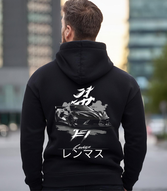 Man wearing the C8 Corvette Specter Hoodie by Renmasu, featuring a sleek black C8 Corvette design with Japanese text on a black premium cotton hoodie.